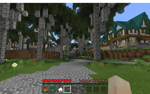 A Minecraft village of timbered houses in a birch forest at midday